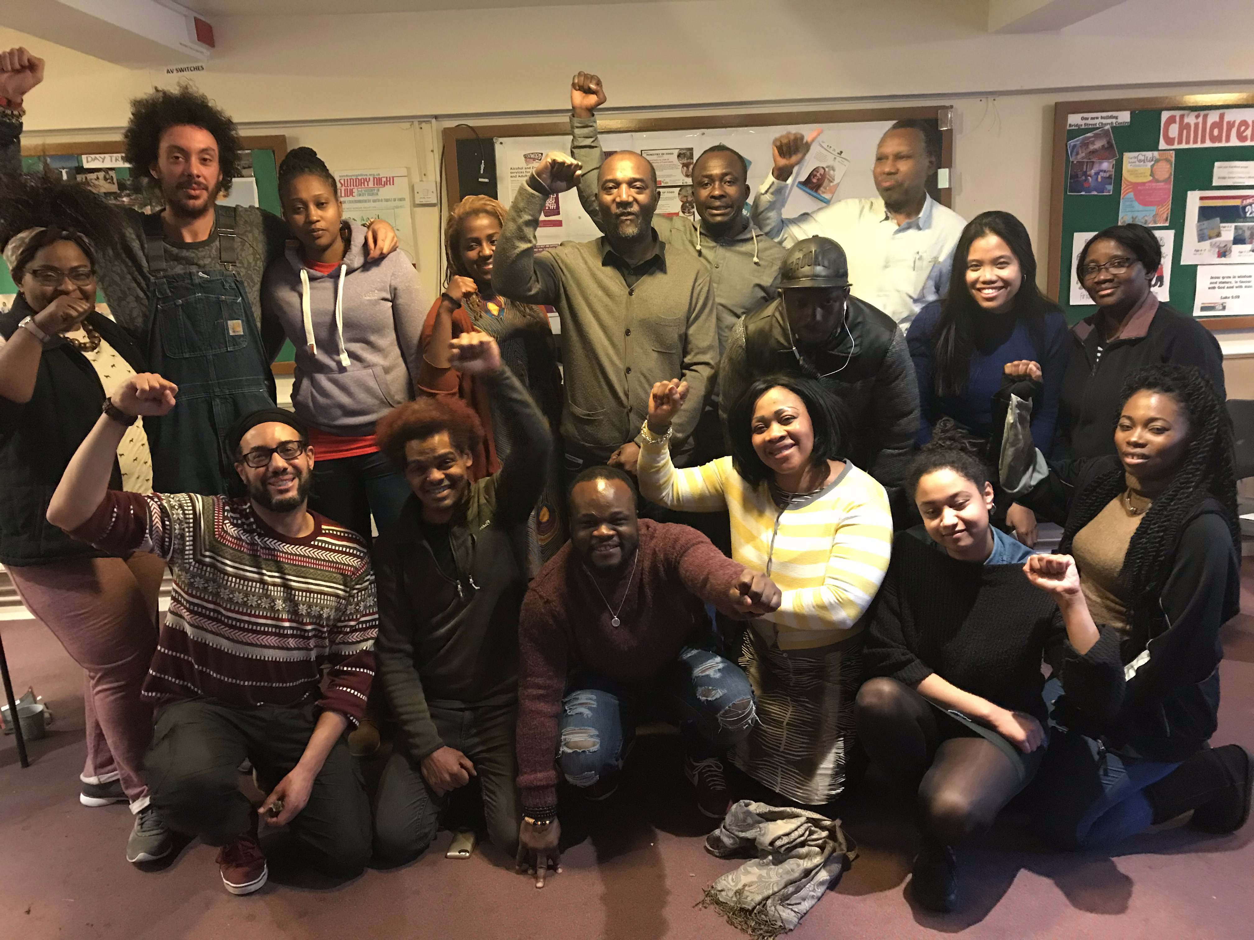 RJN group with raised fists in solidarity