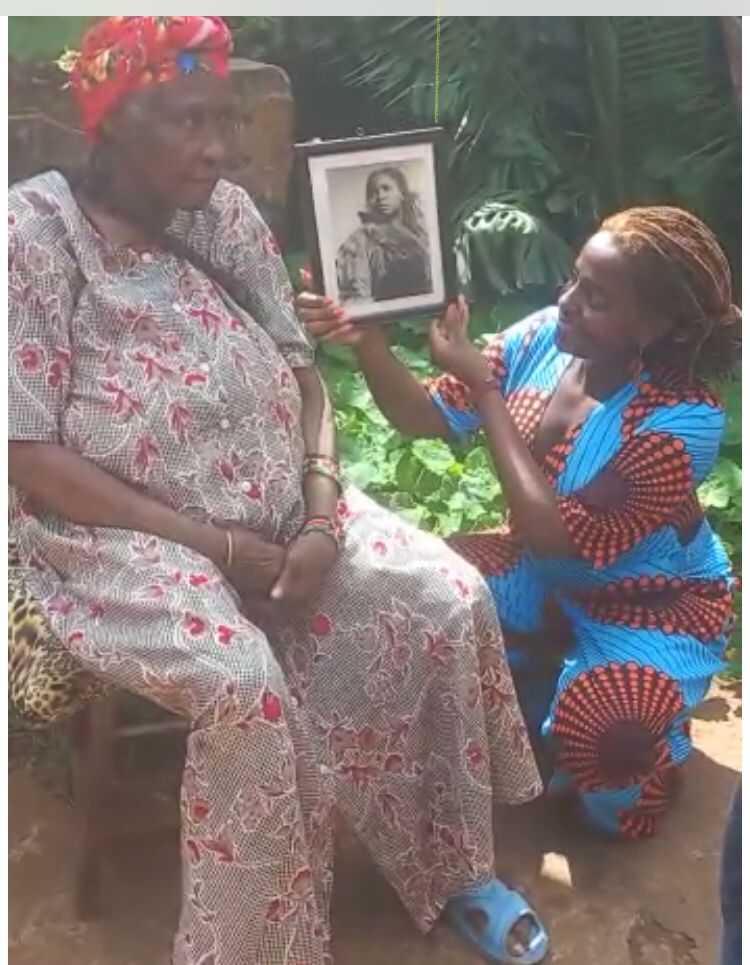 Intergenerational exchange with framed portrait